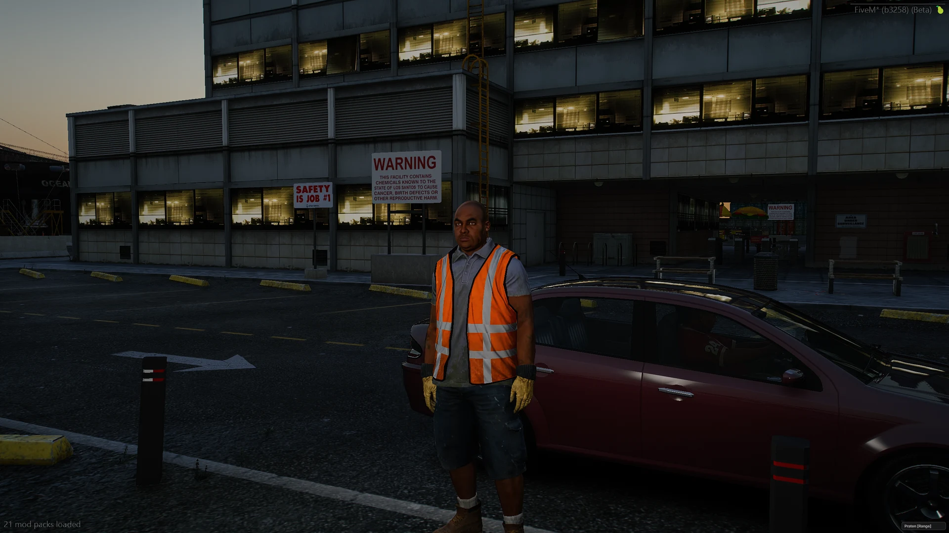 A builder in hi-vis waiting at the kerb at six in the morning.